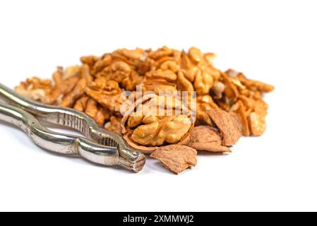 Cracked walnuts against a white background Stock Photo