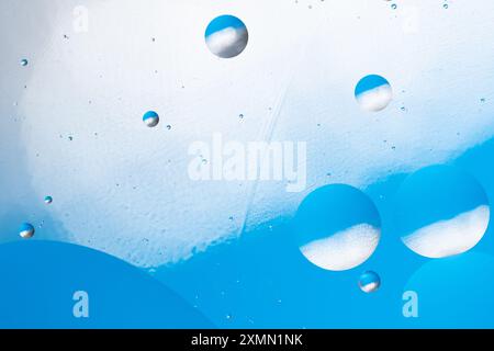 Mental background with round and smooth lines on blue and white abstract background Stock Photo