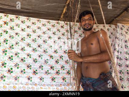 Bangladeshi worker in a block printing factory, Dhaka Division, Rupganj, Bangladesh Stock Photo