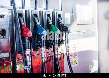 close-up of fuel and gas nozzles at a universal gas station. Global economic crisis and default Stock Photo