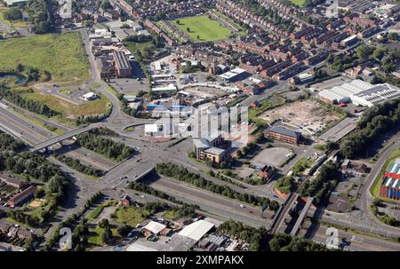 aerial view of industry and businesses at junction 22 of the M60 Manchester Outer Ring Road at Failsworth, Oldham Stock Photo