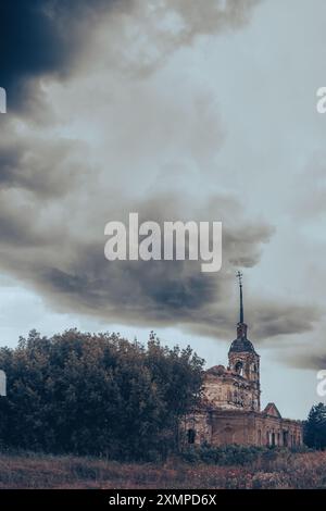 A dilapidated church building, an old church made of red and white brick in a Russian village in the Saratov region. High quality photo Stock Photo