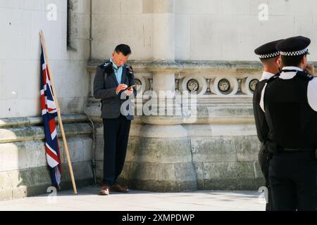 Royal Courts of Justice, London, UK 29th July 2024. Tommy Robinson supporters at the Royal Courts of Justice. Credit: Matthew Chattle/Alamy Live News Stock Photo