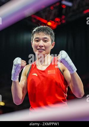 Paris, France. 29th July, 2024. Yang Wenlu of China celebrates after the women's 60kg preliminaries round of 16 of boxing at the Paris 2024 Olympic Games in the North Paris Arena in Paris, France, on July 29, 2024. Credit: Jiang Wenyao/Xinhua/Alamy Live News Stock Photo