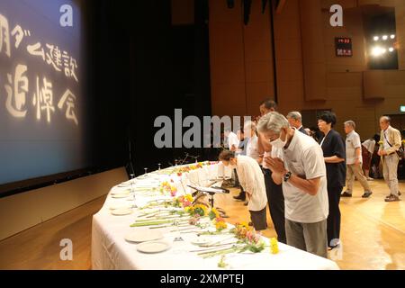 Kanagawa, Japan. 28th July, 2024. People take part in a memorial service at the Sagami Lake Community Center in Kanagawa Prefecture, Japan, July 28, 2024. A memorial service has been held at the Sagami Lake Community Center in Japan's Kanagawa Prefecture to mourn laborers from different countries who died in the Sagami dam construction during the wartime. Credit: Hu Xiaoge/Xinhua/Alamy Live News Stock Photo