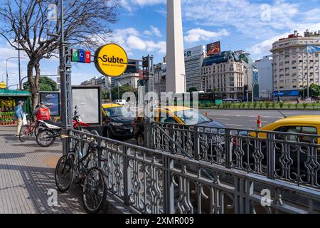 Entrance to a Subte subway station in with the Obelisk behind on 9th of July Avenue in Buenos Aires, Argentina. Stock Photo