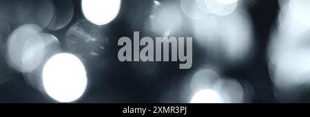 Blurred lights, gray, deep blue background, banner texture. Abstract bokeh with soft light header. Wide screen wallpaper. Panoramic web banner with co Stock Photo