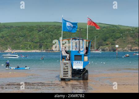 The Sea Tractor on South Sands Beach Salcombe, connecting passengers to the Salcombe to South Sands ferry, with East Portlemouth as a backdrop Stock Photo