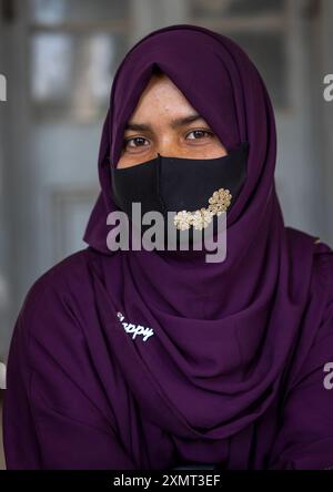 Bangladeshi muslim woman wearing a covid mask, Khulna Division, Jessore, Bangladesh Stock Photo