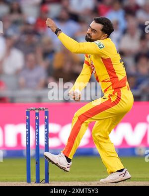 29th July 2024;  Old Trafford Cricket Ground, Manchester, England; The Hundred Mens Cricket, Manchester Originals versus Trent Rockets; Rashid Khan of Trent Rockets in bowling action Stock Photo