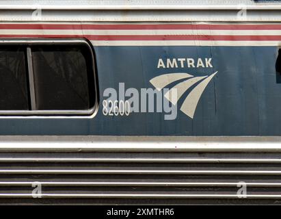 Stamford, CT - June 23, 2024: Amtrak train detail on railroad tracks in Stamford, Connecticut. Stock Photo