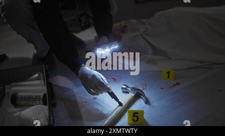 Hammer and crime scene marker with number two isolated on white Stock ...