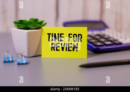 Digital composite of time for review on blackboard. Stock Photo