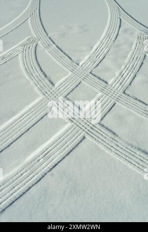Rivian tracks in the snow. Stock Photo