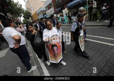 Relatives of the victims of the 43 missing students from the Isidro Burgos Rural Normal School, attending the Mexico City Museum to hold a meeting with the incoming president of Mexico Claudia Sheinbaum Pardo. on July 29, 2024 in Mexico City, Mexico. (Credit Image: © Ian Robles/eyepix via ZUMA Press Wire) EDITORIAL USAGE ONLY! Not for Commercial USAGE! Credit: ZUMA Press, Inc./Alamy Live News Stock Photo