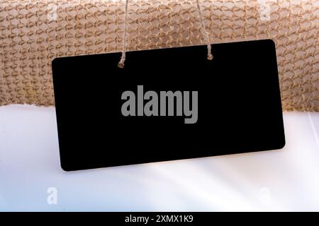 Rectangular shaped black notice board on white ground Stock Photo