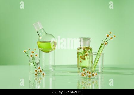 Concept of laboratory, yellow fluid filled in transparent boiling flask, flask and beaker. Rectangle empty podium for display product made from extrac Stock Photo