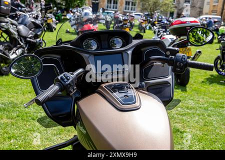 Close-up view of a Indian Challenger Dark Horse motorcycle dashboard with handlebars, mirrors and control panel. At the Calne annual bike meet Stock Photo
