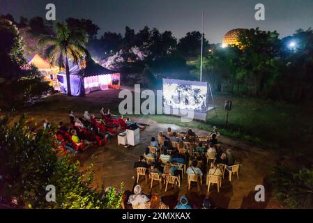 Auroville, India - January 2024 - The Eigth edition of the Auroville Film Festival. AVFF 2024. Screening outdoors in front of the Town Hall building. Stock Photo