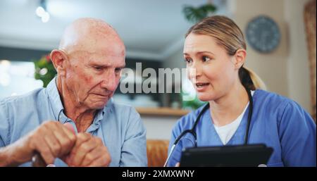 Senior man, nurse and tablet for diagnosis in home, healthcare and talking on recovery treatment. Caregiver, consulting and old person with disability Stock Photo