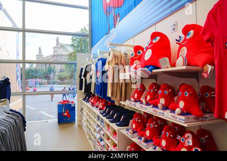 Paris 2024 official store located in a temporary structure on the Champs-Elysées, selling branded merchandise products Stock Photo