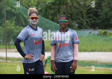 Bangladesh fast bowler Jahanara Alam (L) and Marufa Akhter (R) during Bangladesh Women’s cricket team attends practice at Bangladesh Krira Shikkha Pro Stock Photo