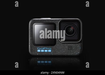 GoPro Hero 12 action camera with display for selfie isolated on black background Stock Photo