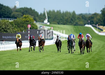 Runners and riders during the HKJC World Pool Lennox Stakes during day one of the Qatar Goodwood Festival at the Goodwood Racecourse, Chichester. Picture date: Tuesday July 30, 2024. Stock Photo