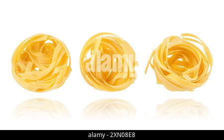 Collection of fettuccine or tagliatelle pasta isolated on white background with clipping path. Stock Photo