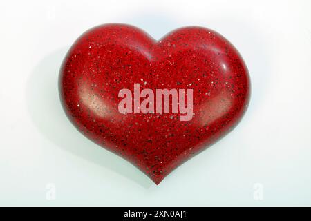 Heart made from Red Quartz with sparkles Stock Photo