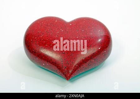 Heart made from Red Quartz with sparkles Stock Photo