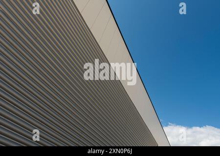 Modern industrial building facade with blue sky Stock Photo