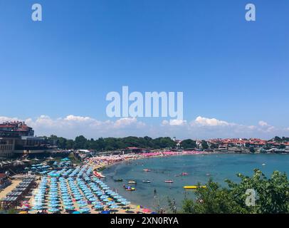 Sozopol, Bulgaria, August 2018: top View of the city beach of the Bulgarian city of Sozopol, with a large number of people sunbathing and swimming in Stock Photo