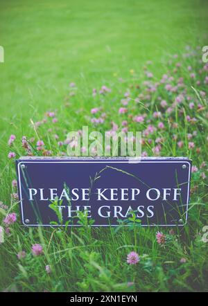 A Please Keep Off The Grass Sign At A Prestigious University College in the UK Stock Photo