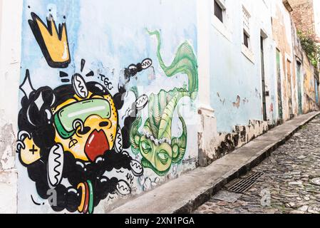 Salvador, Bahia, Brazil - July 27, 2024: Colorful graffiti on the wall of a souvenir shop in Pelourinho, historic center of Salvador, Bahia. Stock Photo