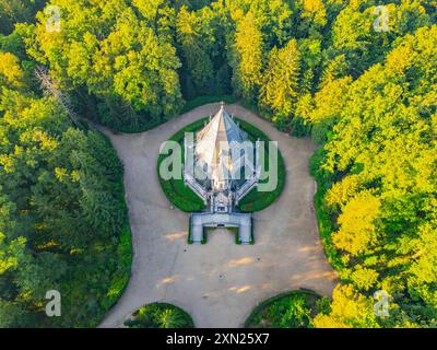 The ornate Schwarzenberg tomb stands majestically in the forest in Domanin near Trebon, Czechia, highlighting intricate architecture amidst lush greenery. Aerial view from drone Stock Photo