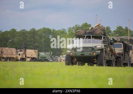 Paratroopers assigned to 1st Battalion, 508th Parachute Infantry Regiment, 3rd Brigade Combat Team, 82nd Airborne Division, move their Infantry Squad Vehicles to Holland Drop Zone in preparation for Panther Avalanche on Fort Liberty, July 23, 2024. Panther Avalanche is an exercise aimed to train and evaluate Paratroopers from the “Panther Brigade” as they prepare for a rotation at the Joint Readiness Training Center, Fort Johnson, Louisiana, in September to enhance brigade and supporting unit's deployment readiness. (U.S. Army photo by Pfc. Aiden O’Marra) Stock Photo