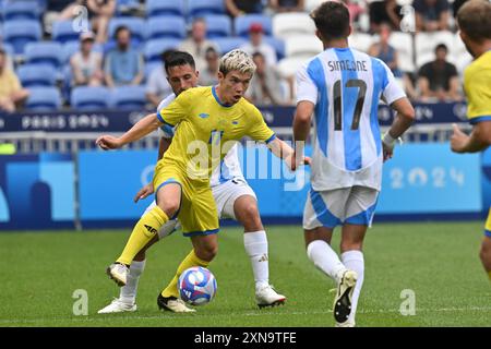 Decines Charpieu, France. 30th July, 2024. Maksym Khlan (Ukraine), Football, Men's Group B between Ukraine and Argentina during the Olympic Games Paris 2024 on 30 July 2024 at Groupama Stadium in Decines-Charpieu near Lyon, France - Photo Frederic Chambert/Panoramic/DPPI Media Credit: DPPI Media/Alamy Live News Stock Photo