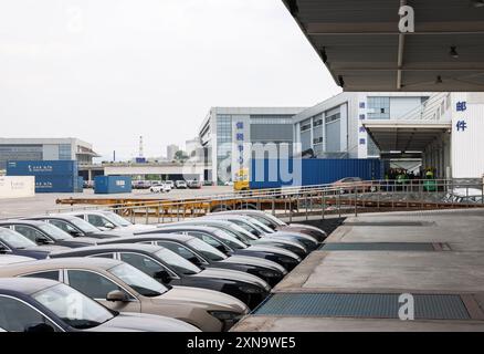 (240731) -- CHONGQING, July 31, 2024 (Xinhua) -- This photo taken on July 30, 2024 shows the Chongqing Railway Port at the Chongqing International Logistics Hub Park in Shapingba District of Chongqing, southwest China. Chongqing International Logistics Hub Park, along with its 62 freight train routes, has risen to be a major hub of international freight trains in the country's western region. As many international logistics channels converge in Chongqing, the mountainous city is leveraging its connectivity, playing a strategic fulcrum role and transforming into a crucial highland for openin Stock Photo