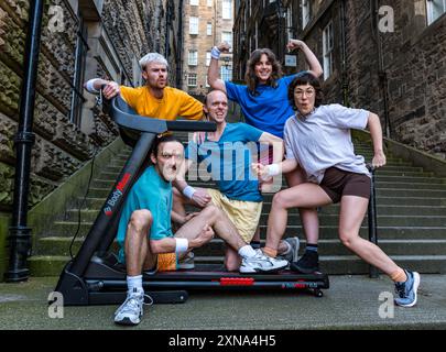 Edinburgh, Scotland, UK, 31 July 2024, Edinburgh Festival Fringe: Australian company Pony Cam make their Edinburgh Fringe debut with their show Burnout Paradise, multi-tasking on four treadmills.  The performers pose carrying treadmills up the Warriston’s Close staircase in the city’s Old Town. Credit: Sally Anderson/Alamy Live News Stock Photo