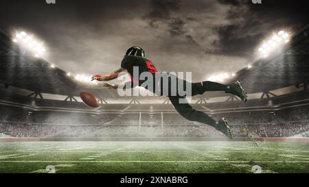 Focused and determined American football player in motion on open air arena, catching ball under dramatic sky. 3D render of stadium Stock Photo