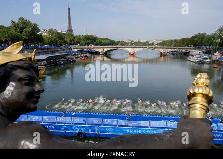 Paris, France. 31st July, 2024. Start of Triathlon - Men's Individual race in Paris Summer Olympics in Paris, France, July 31, 2024. Credit: Ondrej Deml/CTK Photo/Alamy Live News Stock Photo