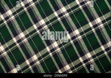 Green checkered fabric. Green and white checkered background.  Top view Stock Photo