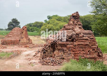 Stacked red bricks, ready for construction, brick kiln site Stock Photo