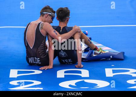 Paris, France. 31st July, 2024. Great Britain's Alex Yee, right, is embraced by Hayden Wilde after crossing the finish in the men's triathlon during the 2024 Paris Summer Olympic Games in Paris, France, Wednesday, July 31, 2024. Yee won the gold medal and Wilde the silver medal. Photo by Paul Hanna/UPI Credit: UPI/Alamy Live News Stock Photo