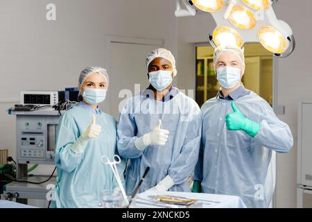 Group of doctors discussing patient cases around table. Stock Photo