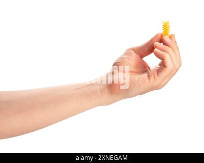pasta eliche in hand path isolated on white Stock Photo