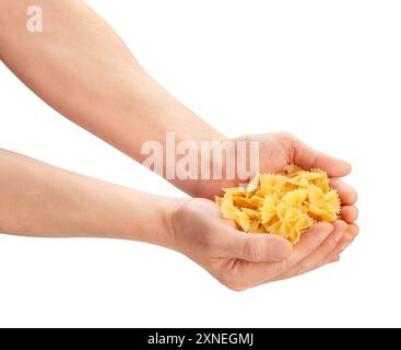 pasta farfalle in hand path isolated on white Stock Photo