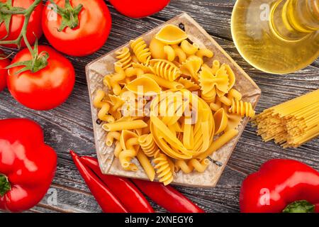 pasta mix on wood background top view Stock Photo
