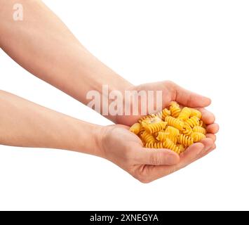 pasta eliche in hand path isolated on white Stock Photo